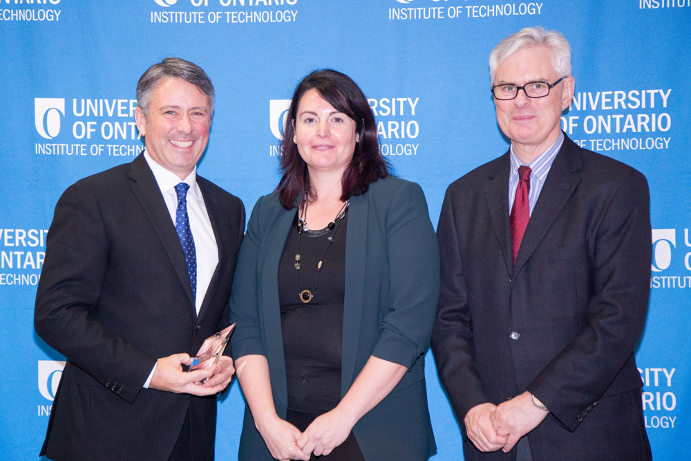 Senior Researcher Award* (from left): PIerre Cote (FHS)*, Jennifer Freeman (Research Services) and President Tim McTiernan.