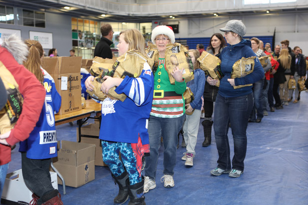 On December 17, members of the campus community helped pack and deliver 150 food hampers for University of Ontario Institute of Technology and Durham College student families in need.