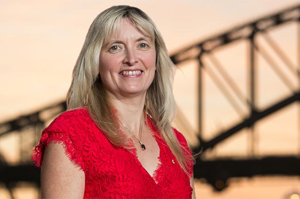 Carolyn McGregor, AM, PhD, Canada Research Chair (alumna) in Health Informatics, Professor, Faculty of Business and Information Technology, at the Sydney Harbour Bridge in Sydney, Australia.