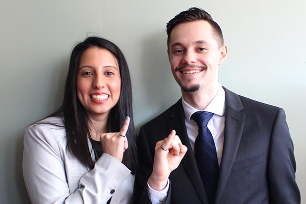 Selenne Verastegui (Mechanical Engineering) (left) and Radu Giurca (Automotive Engineering) were among more than 300 Engineering students who received their Iron Rings during a March 17 ceremony at the university's Regent Theatre.