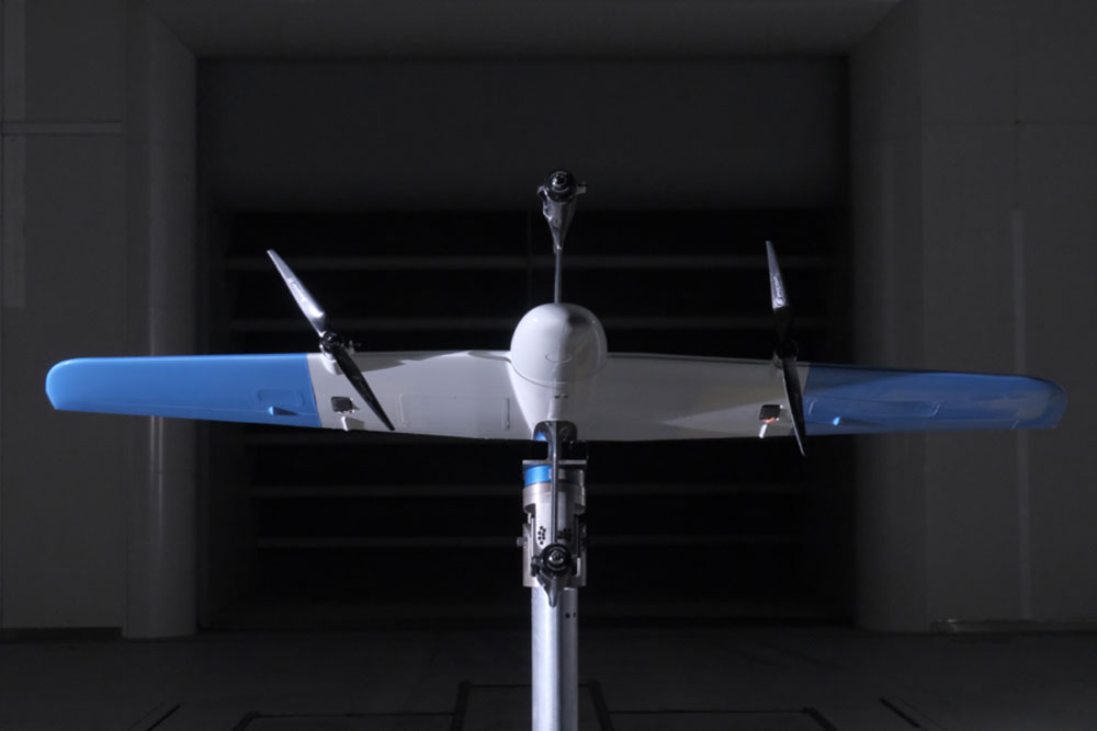 Front view of SkyOne UAV on force-balance inside the ACE Climatic Wind Tunnel.