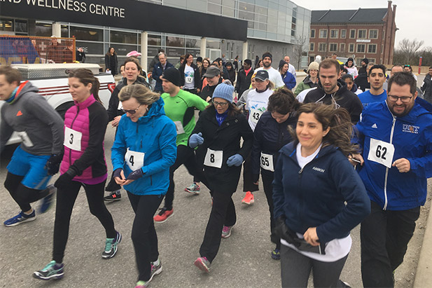 Campus Charity Walk and Run participants outside the Campus Recreation and Wellness Centre.