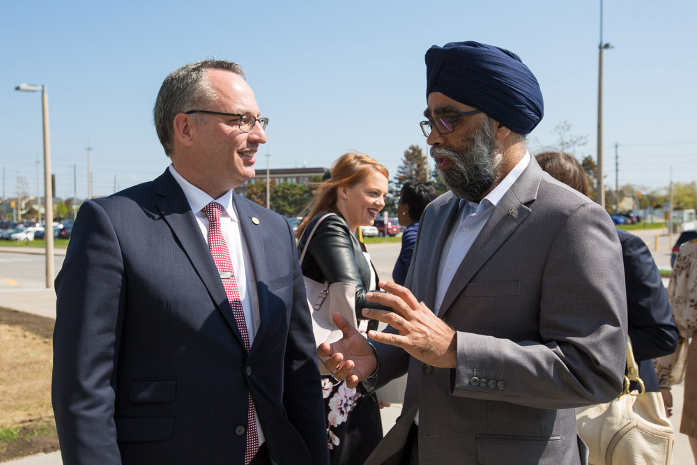 From left: Steven Murphy, PhD, President and Vice-Chancellor, University of Ontario Institute of Technology, greets The Honourable Harjit Singh Sajjan, Minister of National Defence.
