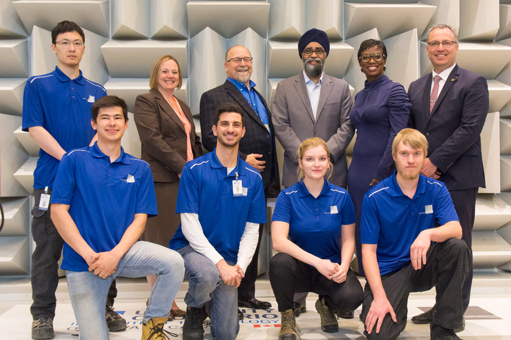 Minister Harjit Singh Sajjan, MP Celina Caesar-Chavannes, and President Steven Murphy with ACE staff and students inside the hemi-anechoic chamber.