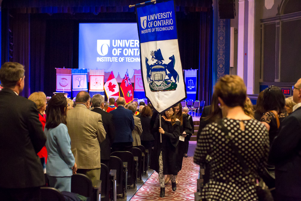 Academic recessional prepares to depart the Regent Theatre following the installation ceremony.