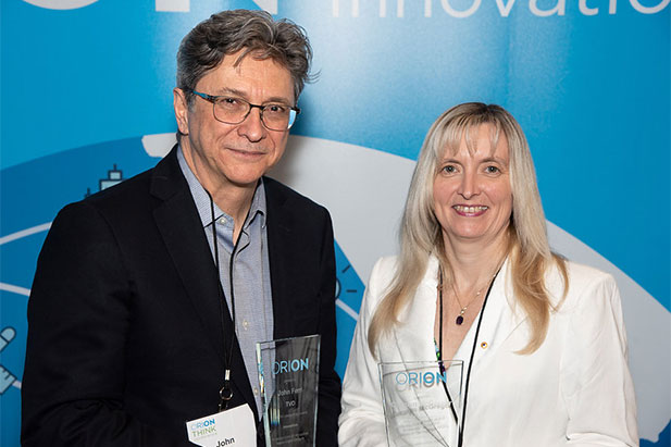 Carolyn McGregor, PhD, Professor, Faculty of Business and Information Technology (right), received ORION’s Leadership Award for Higher Education at the 2018 THINK Conference in Toronto. Dr. McGregor is pictured with John Ferri, Vice-President, Current Affairs and Documentaries, TVO (ORION's Innovation category recipient). Photo courtesy: ORION.