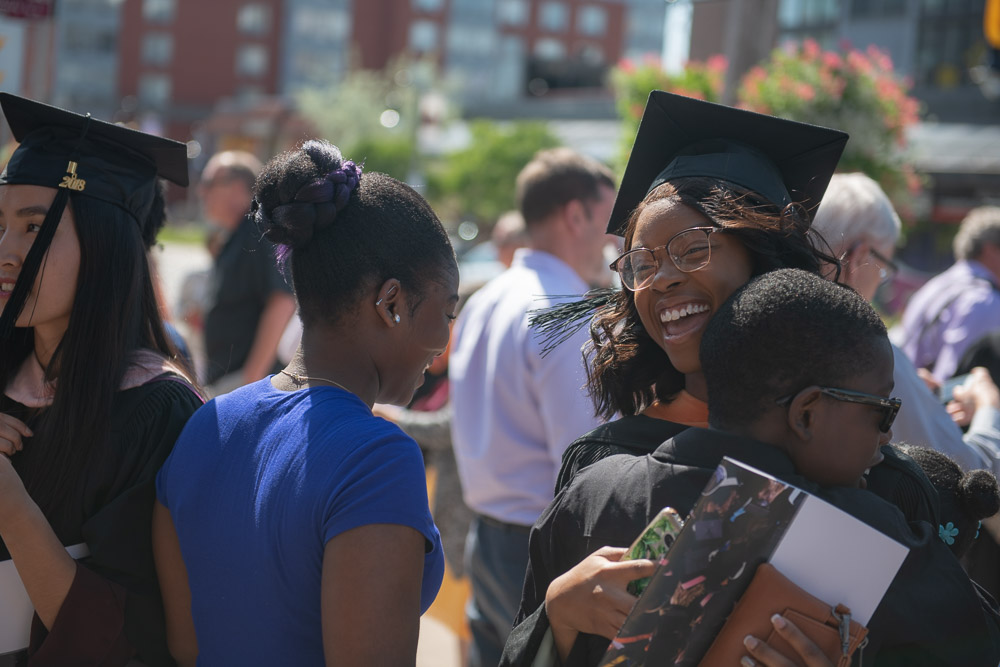 Graduates celebrating with friends and family at Convocation 2018
