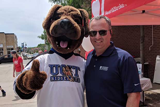 Hunter the Ridgeback with President Steven Murphy.