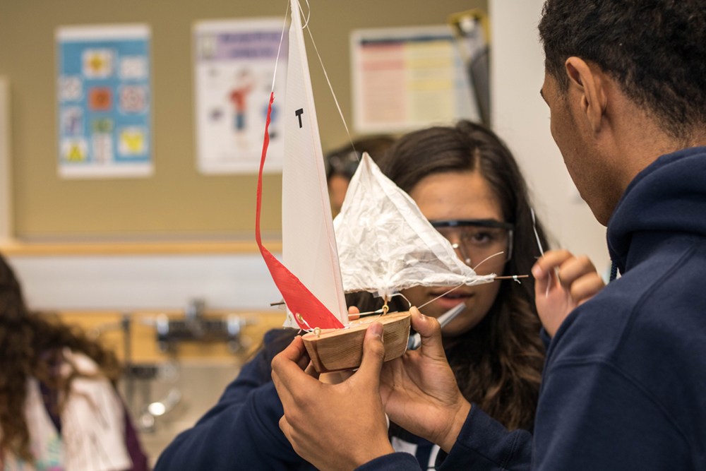 The students learned about aerodynamics by racing sailboats.