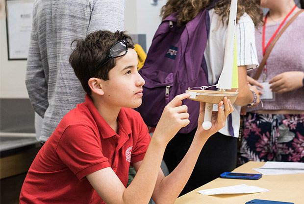 A student from Saltus Grammar School in Bermuda participates in a sailboat racing activity at an enrichment camp hosted this summer at the University of Ontario Institute of Technology.