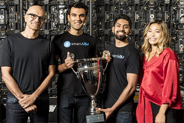 From left: Microsoft CEO Satya Nadella with smartARM team members Hamayal Choudhry and Samin Khan, and Olympic snowboarding gold medalist Chloe Kim, special guest at the Imagine Cup World Finals.
