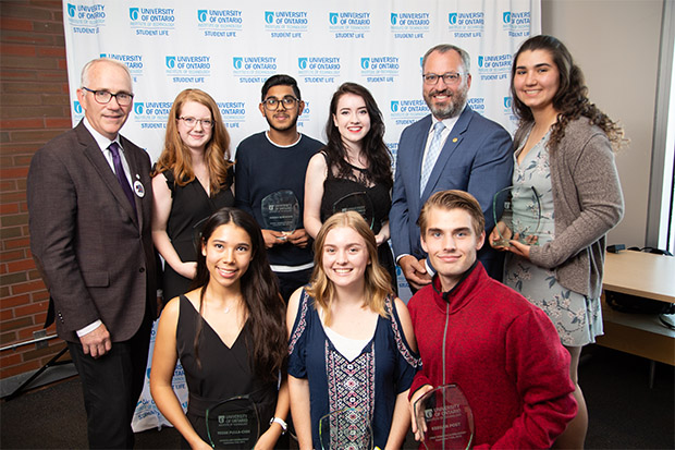 University of Ontario Institute of Technology's 2018 entrance scholarship recipients. Back row (from left): Robert Bailey, PhD, Provost and Vice-President Academic; Erin Mattes (Social Science and Humanities); Aiman Quraishi (Engineering and Applied Science); Hannah Oegema (Business and Information Technology); Steven Murphy, PhD, President; Cristianna Giallo (Science). Front row (from left): Tessie Pulla-Chin (Health Sciences); Courtney Lockhart (Health Sciences); Keegan Post (Energy Systems and Nuclear Science). 