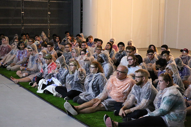 Movie audience decked out in goggles and rain gear for a '4D' screening of the film Twister inside the ACE Climatic Wind Tunnel at the University of Ontario Institute of Technology.