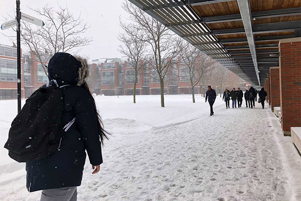 Students walking in winter weather at the  university's north Oshawa campus location