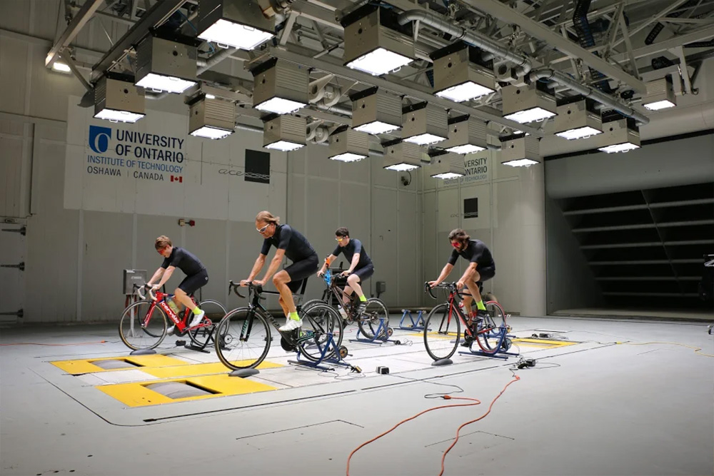 Cyclists pedal on stationary bikes in the ACE Climatic Wind Tunnel as cycling garment manufacturer PEARL iZUMi measures how new products dissipate heat from riders' bodies in varying temperatures, humidity and precipitation conditions. 