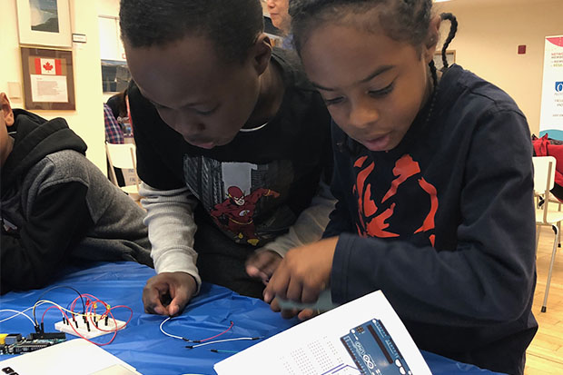 Youngsters check out the Faculty of Engineering and Applied Science's Electronics Lending Library at the Ajax Public Library.