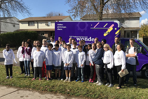 Students and staff at Oshawa's Lakewoods Public School celebrate the arrival of the University of Ontario Institute of Technology's c_wonder Engineering Outreach 'Makers Truck' mobile lab (November 6, 2018).