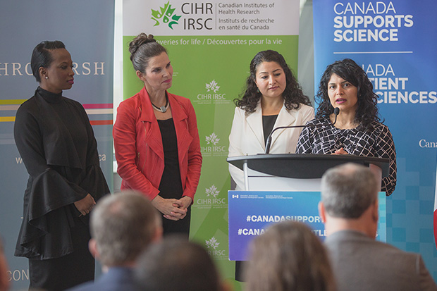 Dr. Shilpa Dogra, Associate Professor and Director of Kinesiology, Faculty of Health Sciences speaks at International Day of Women and Girls in Science announcement at the University of Ontario Institute of Technology (February 11, 2019). Also at podium (from left): Celina Caesar-Chavannes, Whitby MP; The Honourable Kirsty Duncan, Minister of Science and Sport; and The Honourable Maryam Monsef, Minister for Women and Gender Equality.
