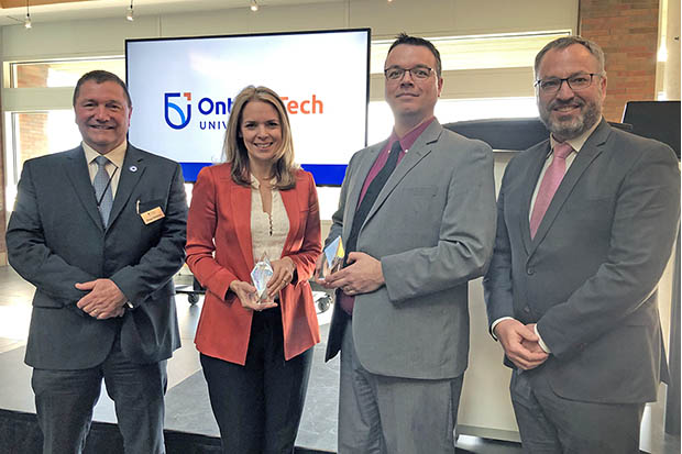 From left: Dr. Douglas Holdway, Vice-President, Research, Innovation and International; Dr. JoAnne Arcand, Faculty of Health Sciences (2018 Early Stage Researcher Award); Dr. Brad Easton (2018 Senior Researcher Award); Dr. Steven Murphy, President and Vice-Chancellor (May 8, 2019).