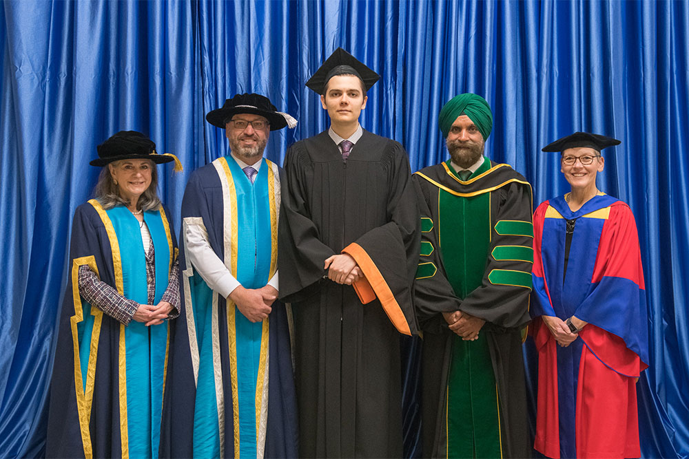 From left: Noreen Taylor, Chancellor; Dr. Steven Murphy, President and Vice-Chancellor; Jonathan Gould Fischer, Faculty of Engineering and Applied Science (FEAS) medal winner, and Governor General Gold Medal winner; Dr. Tarlochan Sidhu, Dean, FEAS; Dr. Lori Livingston, Provost and Vice-President Academic.