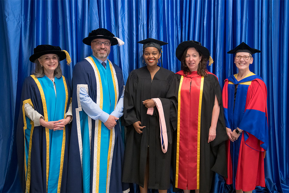 From left: Noreen Taylor, Chancellor; Dr. Steven Murphy, President and Vice-Chancellor; Honoline Francis, World University Services of Canada Scholarship Student, Faculty of Health Sciences (FHSc); Dr. Bernadette Murphy, Interim Dean, FHSc; Dr. Lori Livingston, Provost and Vice-President Academic.