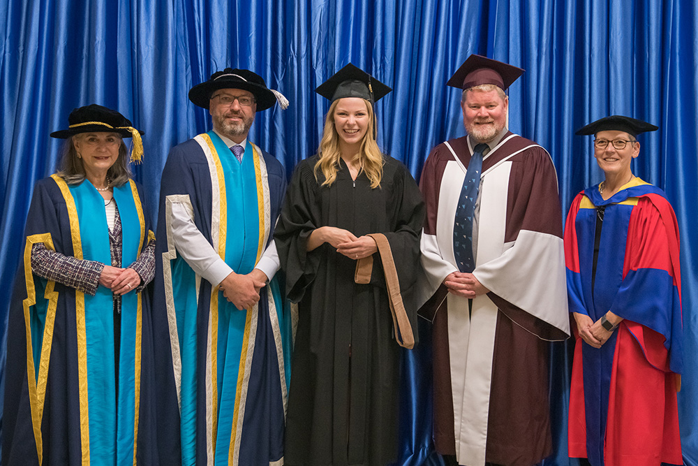 From left: Noreen Taylor, Chancellor; Dr. Steven Murphy, President and Vice-Chancellor; Emily Flim, Faculty of Business and Information Technology (FBIT) medal winner (tie); Dr. Michael Bliemel, Dean, FBIT; Dr. Lori Livingston, Provost and Vice-President Academic.