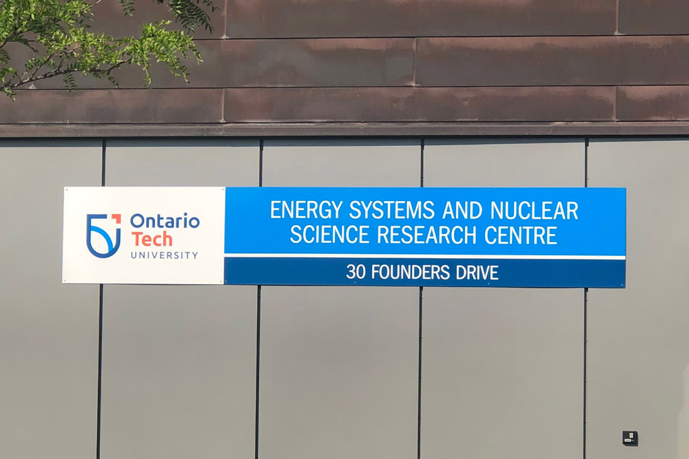 New sign on the Energy Systems and Nuclear Science Research Centre with the new Ontario Tech University Logo
