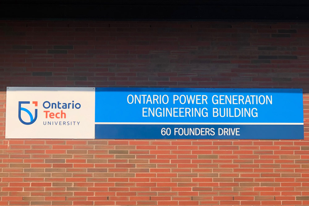 New sign on the Ontario Power Generation Engineering building with the new Ontario Tech University Logo