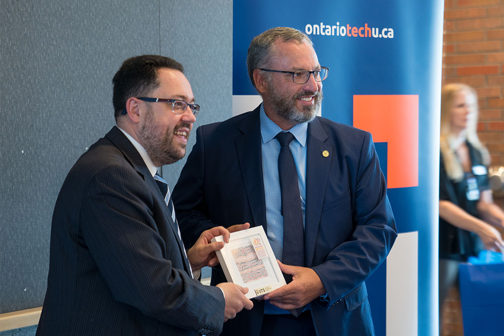 From left: Professor Michael Blumenstein, Associate Dean, Research Strategy & Management, Faculty of Engineering and IT, University of Technology Sydney, with Dr. Steven Murphy, President and Vice-Chancellor, Ontario Tech University.