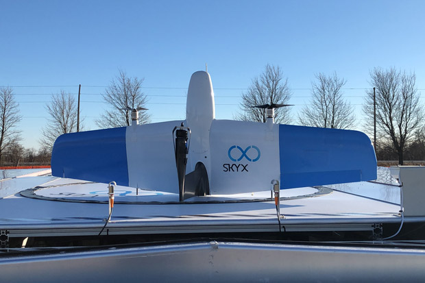 SkyX drone on an xStation drone charging platform prior to vertical take-off deployment.