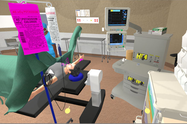 Image of a virtual reality medical environment where health-care trainees test their skills and knowledge in handling patient anesthesia crisis scenarios in a simulated operating room.
