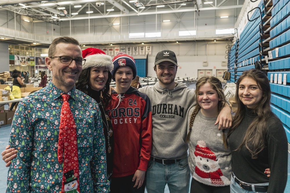 The success of the campus Holiday Food Drive would not be possible without the kindness of volunteers, who rolled up their sleeves on December 15 to help sort, pack and deliver food to students in need.