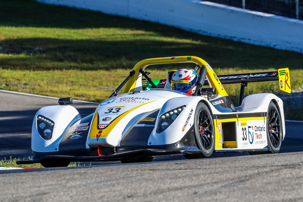 Race car driver and Ontario Tech University Board of Governors Chair Doug Allingham behind the wheel of a SR3 RS.