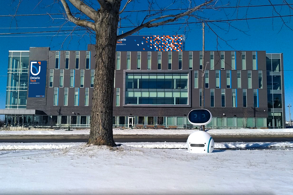 Ontario Tech University researchers are programming robots such as ASUS’ Zenbo (pictured in front of the university's Software and Informatics Research Centre) to support mindfulness-based stress reduction training for older adults.