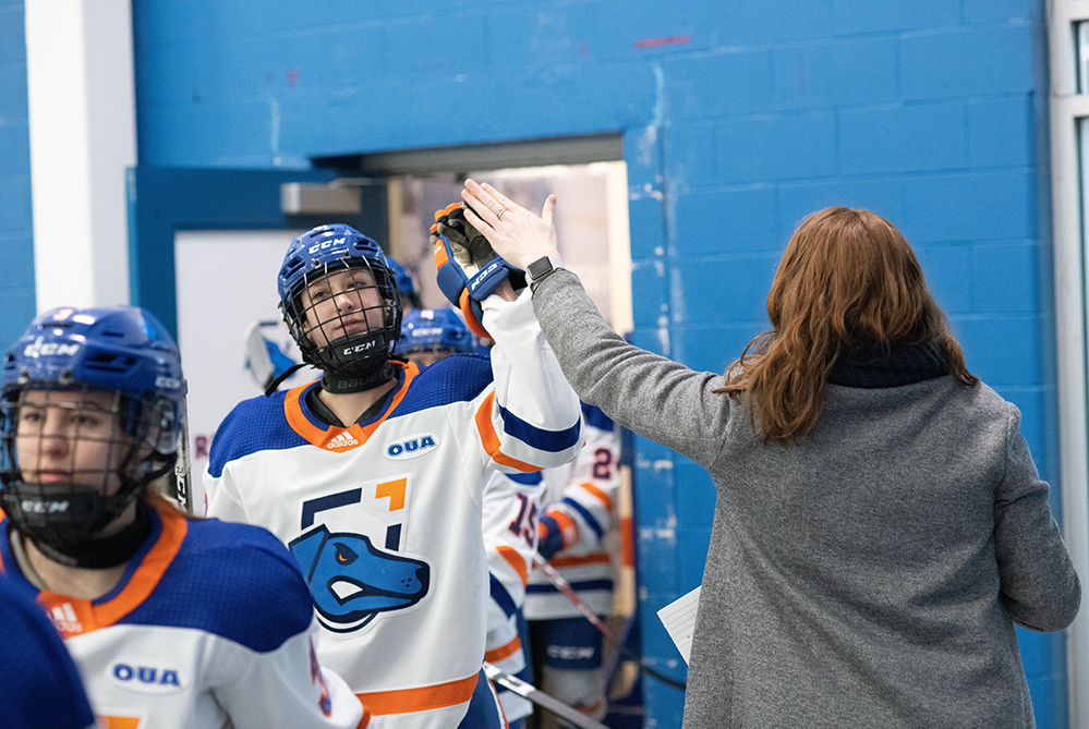 Ridgebacks women's hockey player Kassidy Ford preparing for a game at the Campus Ice Centre.