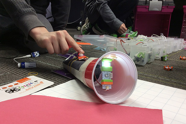 Participants using a LittleBits snappable circuit kit to create a flashlight during a previous March Break Maker Camp at Ontario Tech University.