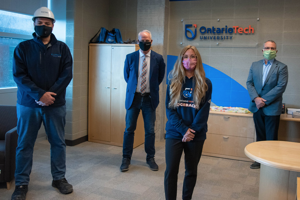From left: Yamen Al Sabbagh, Project Manager, Eastern Construction; Mayor Dan Carter, City of Oshawa; Alana Waloszek, third-year Faculty of Health Sciences student; Dr. Steven Murphy, President and Vice-Chancellor, Ontario Tech University