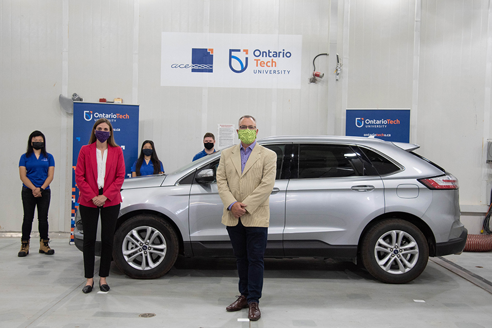 Lindsey Park (MPP for Durham, second from left) with Dr. Steven Murphy, President and Vice-Chancellor, Ontario Tech University (right), with Ontario Tech University students during a visit to ACE, the university's one-of-a-kind climatic wind tunnel and R&D facility.