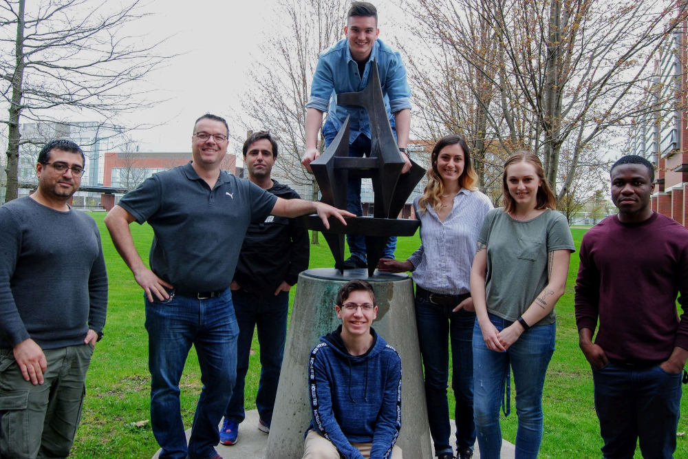 Award of Excellence in Graduate Supervision recipient Dr. Brad Easton, Professor, Faculty of Science (second from left), with graduate students in his Materials Chemistry research group (photo taken in May 2019).