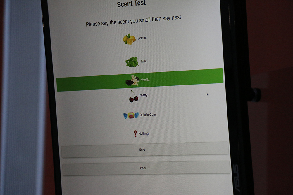 Screen to enter scent test results/observations. If user identifies correct scent, the final confirmations are temperature check and the presence of a mask on the user's face.