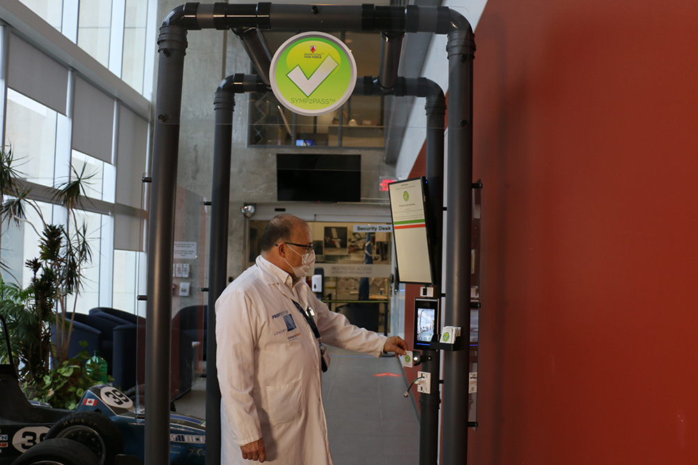 SmartCone COVID-19 SYMP2PASS Smart Kiosk outside the main entrance to the ACE Climatic Wind Tunnel at Ontario Tech University.