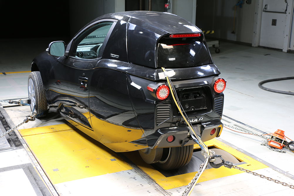 Rear-view of the Solo EV in the ACE Climatic Wind Tunnel. Note the single back wheel.