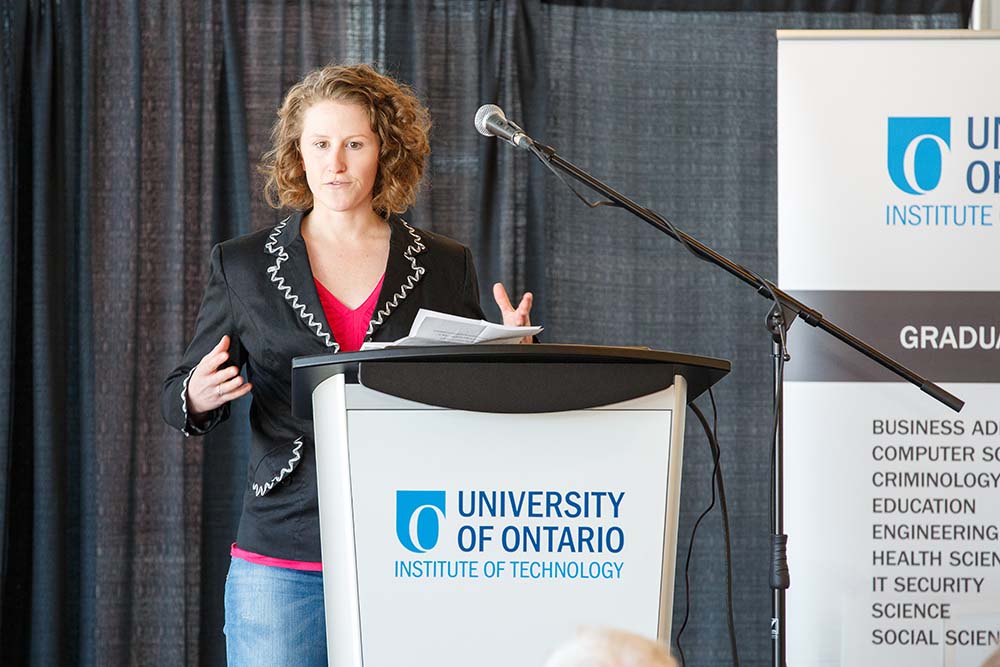 Emily Bremer competing in the Three Minute Thesis competition at Ontario Tech in March 2014 (formerly known as University of Ontario Institute of Technology).