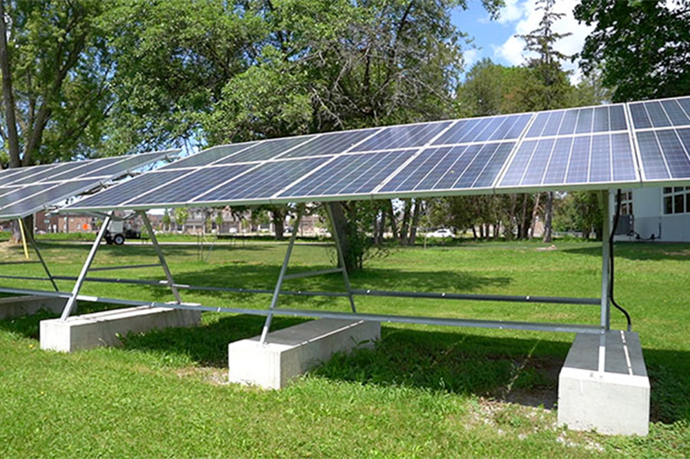 Ground-level solar panel installation at Windfields Farm.