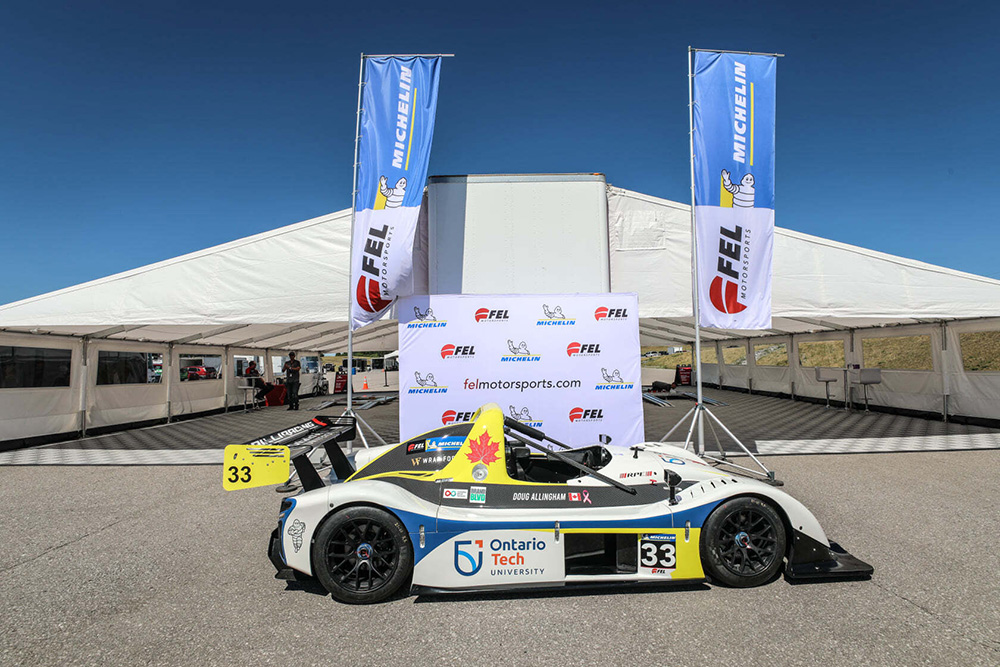 image of auto racing car with ontario tech logo