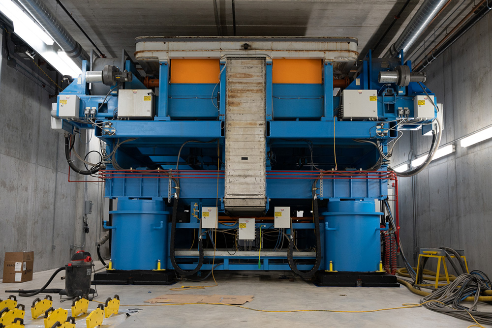 The ACE dynamometer 'parked' underground, away from the Climatic Wind Tunnel while the Moving Ground Plane is in place. The 120-tonne dynamometer is the ACE Climatic Wind Tunnel's other 'plug and play' automotive research tool.