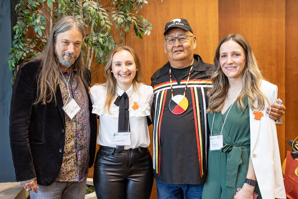 Emmeline Meens Miller (second from left) with Ontario 3MT judging panel (from left): Rob Baker of The Tragically Hip; Miptoon, Knowledge Holder and Councillor of the Chippewas of Nawash Unceded First Nation; and  Olympian and University of Guelph alumna Mirela Rahneva. (photo credit: Karen Whylie, University of Guelph)
