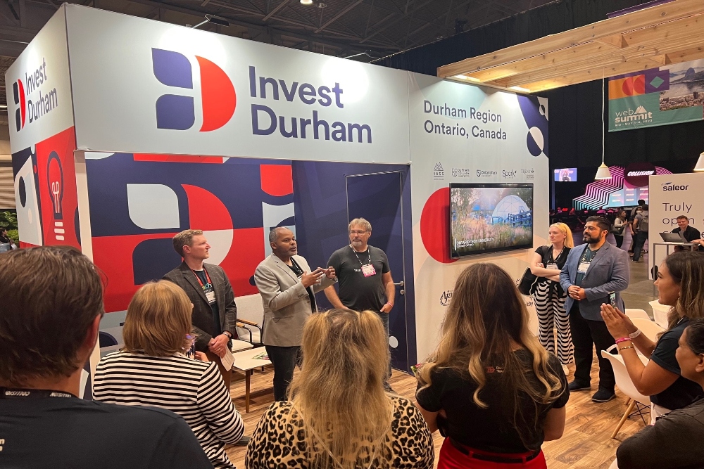 Ontario Tech Brilliant Catalyst and 1855 Technology Accelerator (Whitby) partnership announcement at the Invest Durham booth at the 2022 Collision Conference (Enercare Centre, Toronto, June 22, 2022). From left: Simon Gill, Director of Economic Development and Tourism, Durham Region; Dr. Osman Hamid, Director of Creativity and Entrepreneurship, Brilliant Catalyst, Ontario Tech University; Dennis Croft, CEO, 1855 Technology Accelerator (Whitby). 