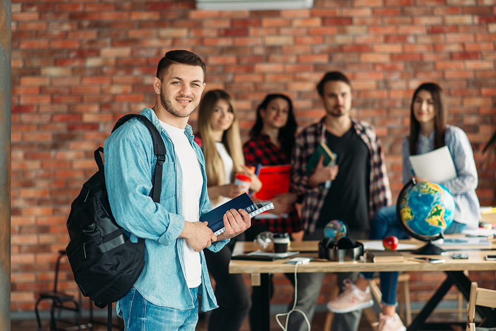 image of youth socializing in a school setting.