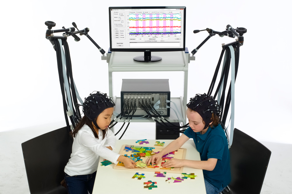 Near-infrared spectroscopy caps measure brain function through a variety of sensors. The caps allow patients to move naturally in a clinical setting and will help researchers discover neural mechanisms related to social interactions.